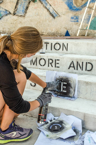 Barbara stenciling the text